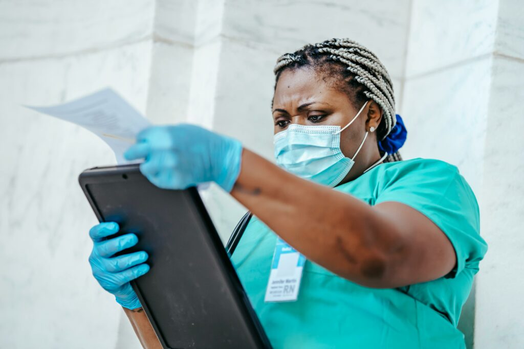 healthcare worker viewing documents