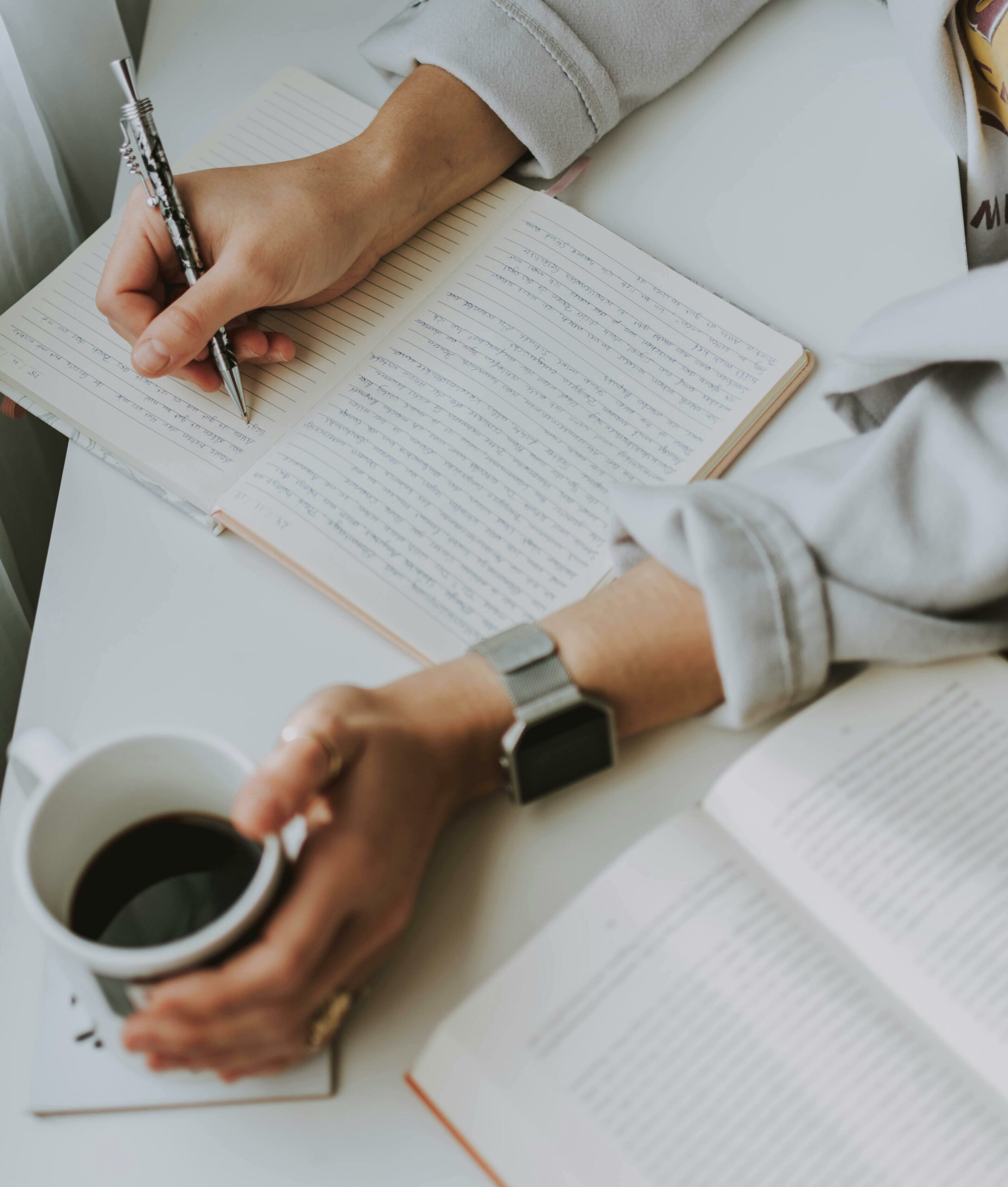 student studying with coffee