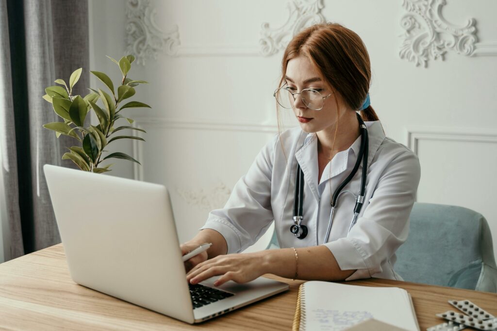 healthcare professional studying on computer